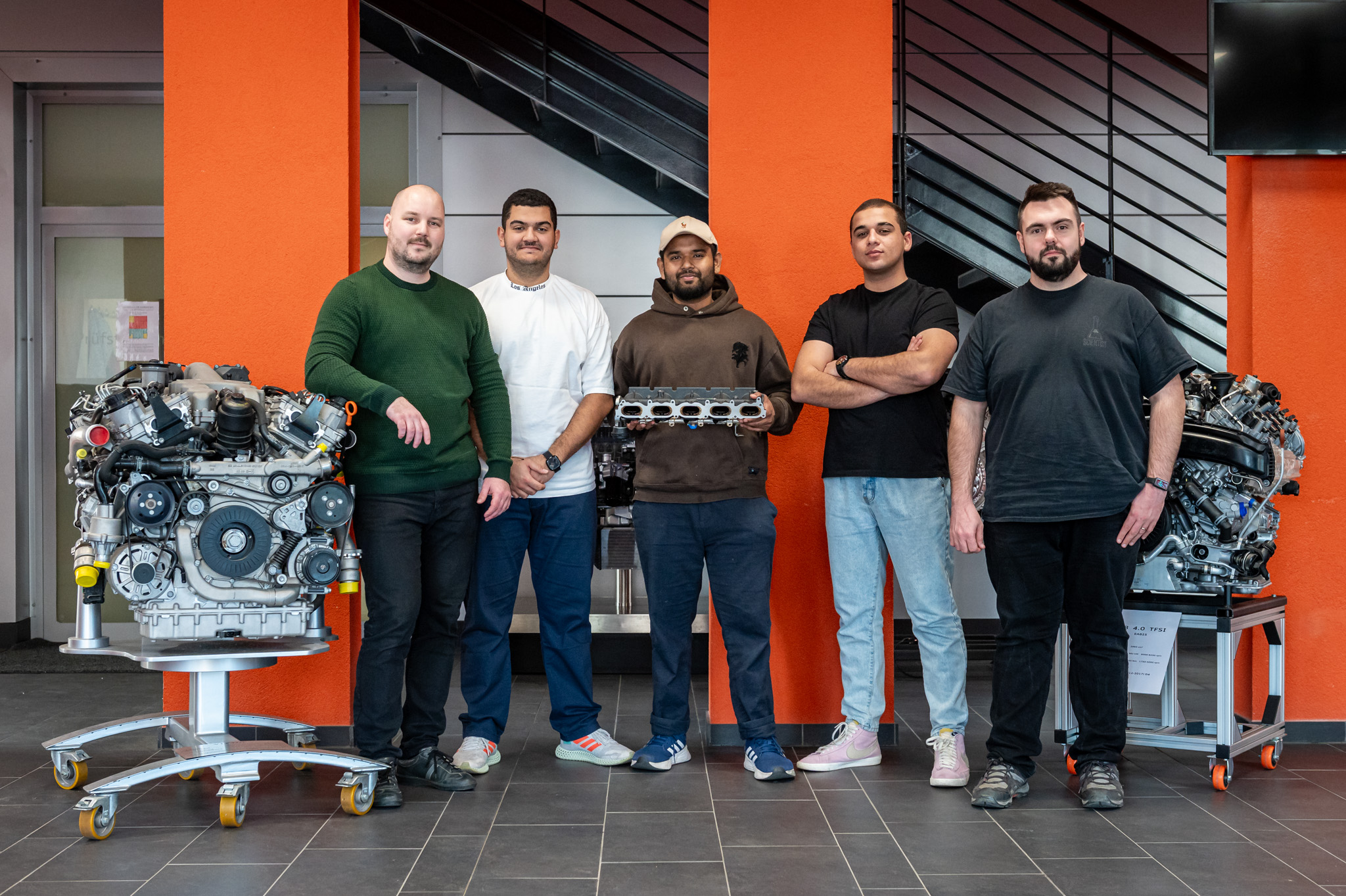 Gábor Nagy, engineer at the department and head of the Engine Testing Laboratory, with Zaid Mursi (Jordan), Hasan Rafiul (Bangladesh), Akram Al Saify (Jordan), and assistant lecturer Ádám István Szabó from the Tribology Laboratory. (Photo: Máté Dudás)